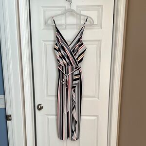 Stylish LOFT Outlet sleeveless v-neck sundress with a striped pattern.  Like New